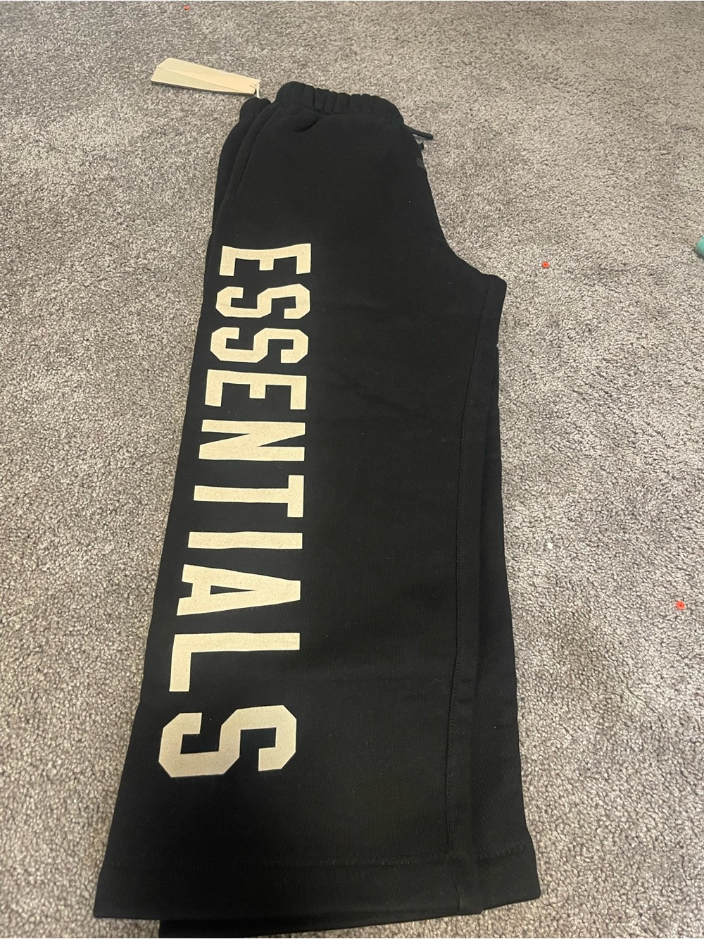 Fear of God Kids Black Sweatpants with Cream ESSENTIALS Script